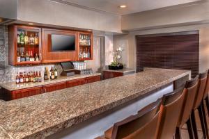 a large kitchen with a large counter top at Ayres Suites Yorba Linda/Anaheim Hills in Anaheim