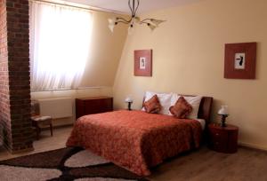Postel nebo postele na pokoji v ubytování Enjoy Inn