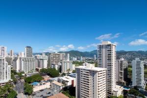 a view of a city with tall buildings at Ocean View Studio, Near Waikiki Beach in Honolulu +51 photos