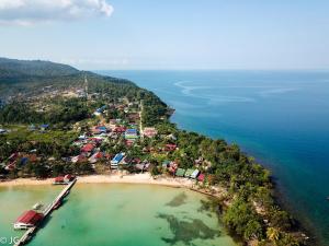 an aerial view of a small island in the ocean at Easy Tiger Garden Bungalows - by Beach House Cambodia in Koh Rong Sanloem