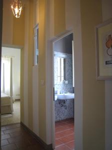 Postel nebo postele na pokoji v ubytování Fontelunga Hotel & Villas