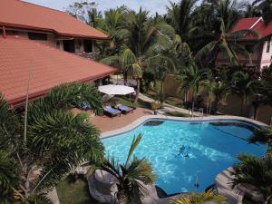 Вид на бассейн в Casa Cataleya Bohol Self-service Apartments или окрестностях