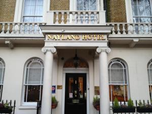 a hotel with a sign on the front of a building at The Nayland Hotel in London