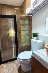 Koupelna v ubytování Merida Serviced Apartments
