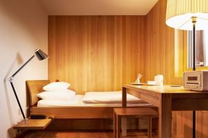 Cama o camas de una habitación en Krone Hittisau - Hotel & Restaurant im Bregenzerwald