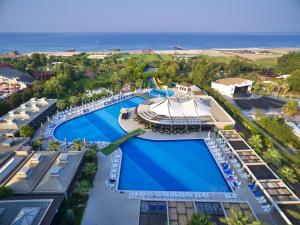 an aerial view of a resort with a swimming pool at Sunis Elita Beach Resort Hotel & SPA in Kizilagac