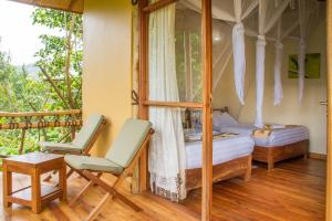 Balkón nebo terasa v ubytování Ichumbi Gorilla Lodge