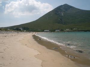 a beach with a mountain in the background at Holiday Home Glenvale Cottage by Interhome in Valley