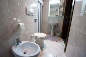 Koupelna v ubytování Hotel Beau Site