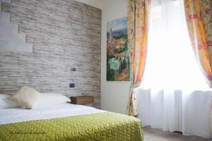 Postel nebo postele na pokoji v ubytování Aurelia Rooms