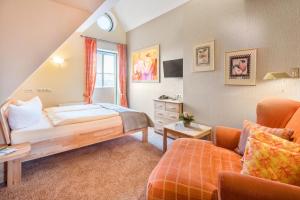 Ein Bett oder Betten in einem Zimmer der Unterkunft Hotel Altes Zollhaus