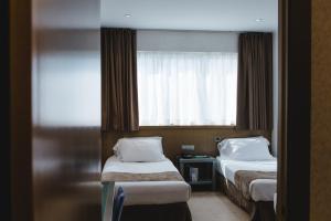 Postel nebo postele na pokoji v ubytování Hotel Mas Camarena