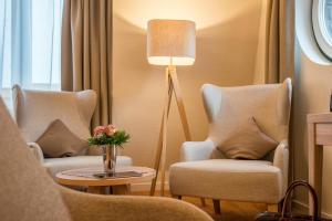 Ein Sitzbereich in der Unterkunft Hotel Altes Zollhaus