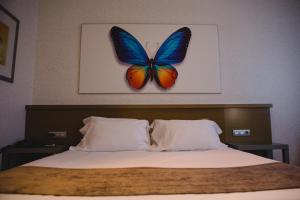 Postel nebo postele na pokoji v ubytování Hotel Mas Camarena