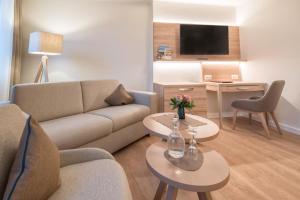 Ein Sitzbereich in der Unterkunft Hotel Altes Zollhaus