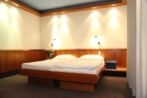 Łóżko lub łóżka w pokoju w obiekcie Prielmayerhof HOTEL