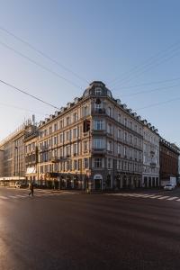 a large building on the side of a street at Hotel Alexandra in Copenhagen