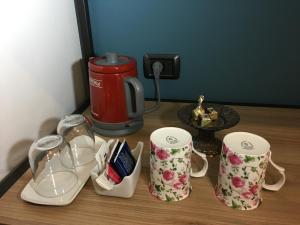 Příslušenství pro přípravu čaje a kávy v ubytování Casa Chiara B&B
