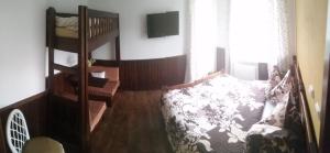 Łóżko lub łóżka w pokoju w obiekcie Vila Patricie