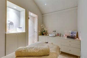 a bedroom with a bed and a sink and a counter at Sant Jaume Design Hotel in Palma de Mallorca