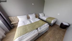 Säng eller sängar i ett rum på Hótel Laugarbakki