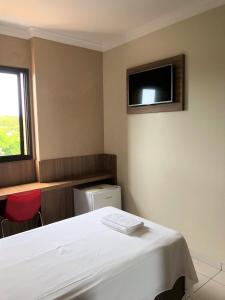 Postel nebo postele na pokoji v ubytování Hotel 2 Gauchos