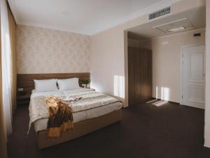 Postel nebo postele na pokoji v ubytování Hotel Alkor + 37 fotografií