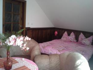 Łóżko lub łóżka w pokoju w obiekcie Vila Patricie