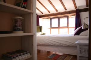 Postel nebo postele na pokoji v ubytování Casa Guareña