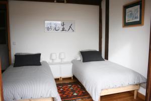 Postel nebo postele na pokoji v ubytování Casa Guareña