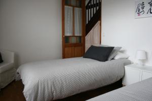 Postel nebo postele na pokoji v ubytování Casa Guareña