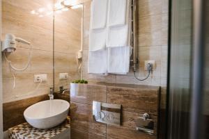 Koupelna v ubytování Hotel Alkor