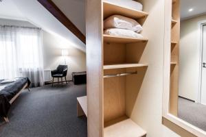 Postel nebo postele na pokoji v ubytování Spa Hotel Ezeri