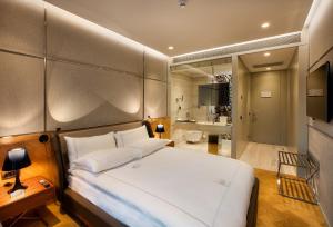 Cama ou camas em um quarto em Fer Hotel