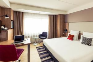 Postel nebo postele na pokoji v ubytování Mercure Hotel Nijmegen Centre