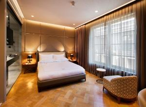 Cama ou camas em um quarto em Fer Hotel