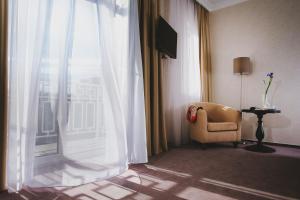 TV a/nebo společenská místnost v ubytování Hotel Alkor