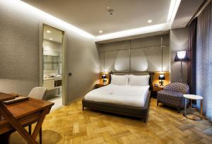 Cama ou camas em um quarto em Fer Hotel