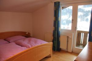 Ein Bett oder Betten in einem Zimmer der Unterkunft Laberer by Schladmingurlaub