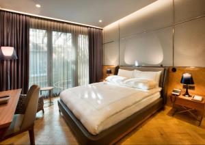 Cama ou camas em um quarto em Fer Hotel