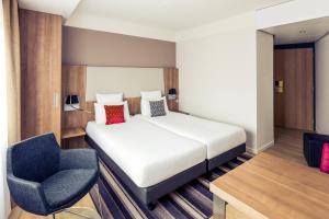 Postel nebo postele na pokoji v ubytování Mercure Hotel Nijmegen Centre