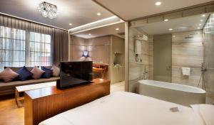 Um banheiro em Fer Hotel