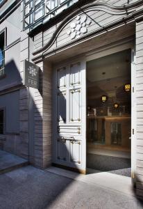 A fachada ou entrada em Fer Hotel