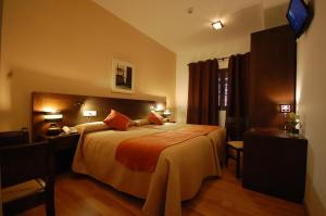 Posteľ alebo postele v izbe v ubytovaní Hotel Hospederia San Francisco + 36 fotografií