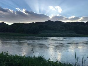 a view of a river with mountains in the background at Olive Hill Guest House in Robertson