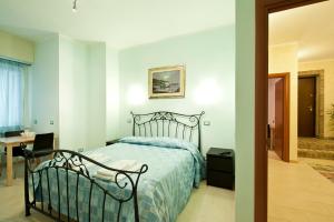 Giường trong phòng chung tại B&B La Porta