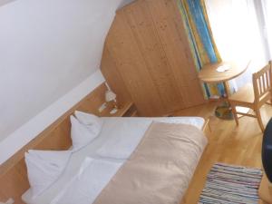 Łóżko lub łóżka w pokoju w obiekcie Pension - Bauernhof