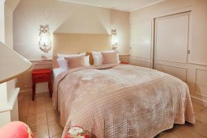 Katil atau katil-katil dalam bilik di Ferienwohnung Kliffsand