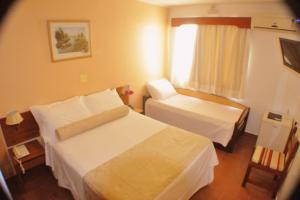 Postel nebo postele na pokoji v ubytování Hotel Torremolinos
