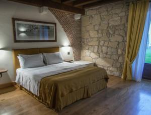 Кровать или кровати в номере Delser Verona Manor House